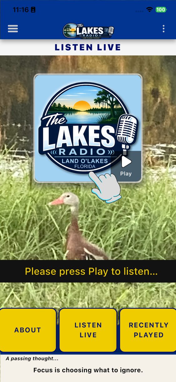 The Lakes Radio listener app showing the Listen Live screen with a custom station wallpaper